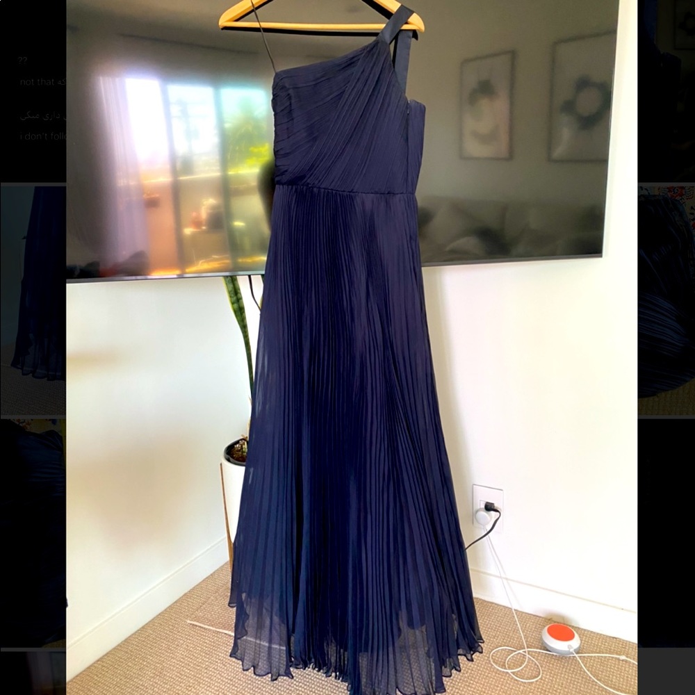 Brand new, gorgeous maxi dress in dark navy color. Pleated. Never worn. No tags